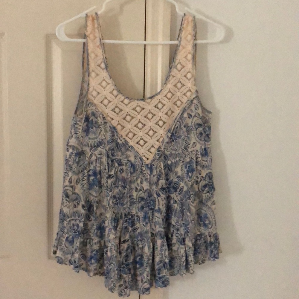 Cute Free People tank top with lacy trim